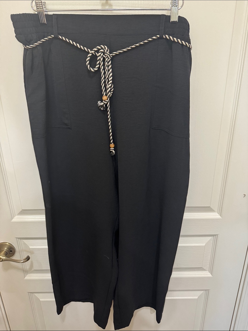Black Wide-Leg Women's Pants with Rope Tie. Length 25” leg width 26” ankle 22”.